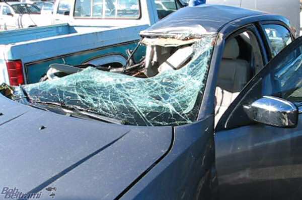 The Totalled Car in the Wrecker Yard