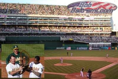 A record crowd attended the game.  Inset, a pre-game ceremony with Carney and Hindu