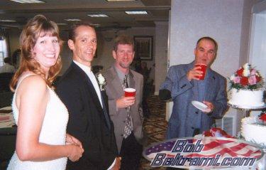 Trish, me, Rob and Ted checking out the cake.  Why does Ted look like he's trying to duck behind the table?